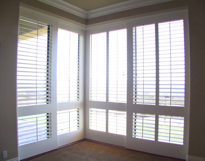 sliding wood shutter doors with specialty features - Kaanapali